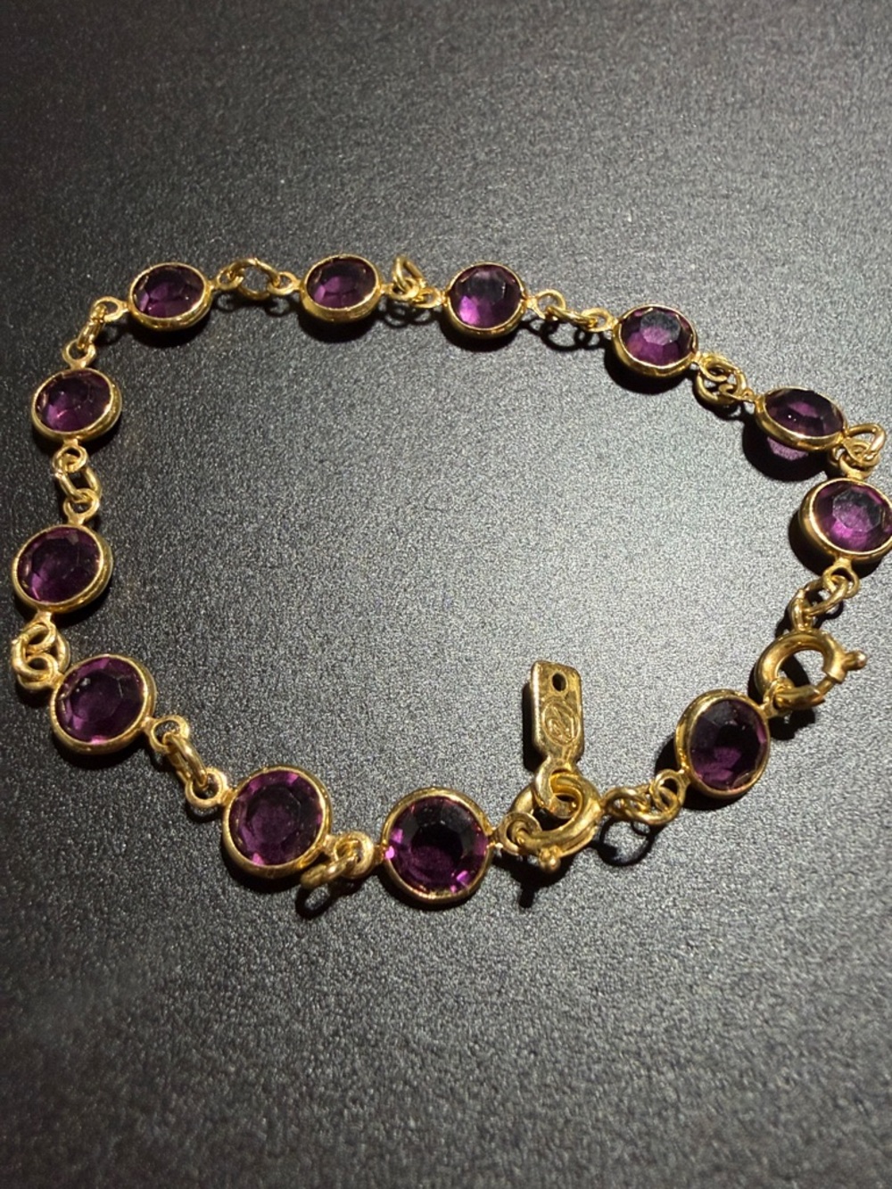 Gold Bracelet with Purple Gemstone Accents